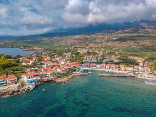 Aerial scenic view over the seaside village Agios Nikolaos and the picturesque old port near Kardamyli, Peloponnese
