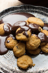 Delicious Asian small cookies with melting chocolate.