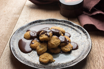 Delicious Asian small cookies with melting chocolate.