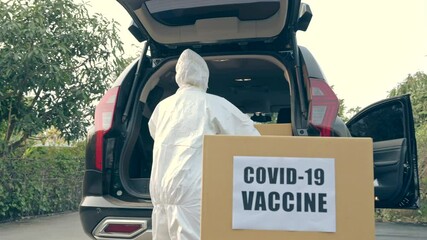 health worker transporting COVID-19's vaccine