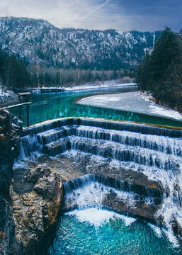 Lechfall F&uuml;ssen. Dam on the river in winter in the Alps. Bavaria, Germany.