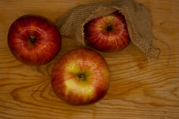 .Between wood and fabric aerial view of sweet apples