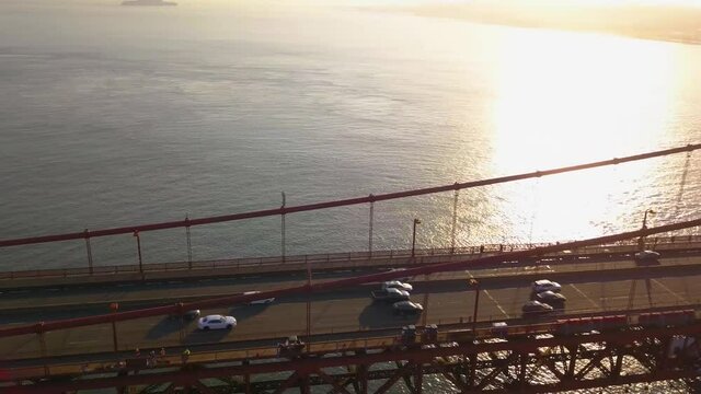 Beautiful Sunset over Downtown San Francisco and the Golden Gate Bridge. Very unique and rare drone aerial footage of California's iconic bridge over the bay.