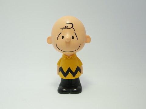 Charlie Brown figure. Owner of the beagle dog Snoopy from the comic strip Peanuts.