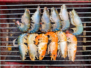Fresh river prawn grilling on the charcoal stove