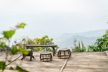 Wooden chair and table at the peak of mountain