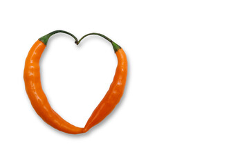 Orange chili peppers with green stem forming a heart on a white background, Valentine's Day.