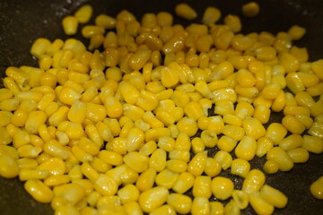 Yellow Corn Niblets in a frying pan