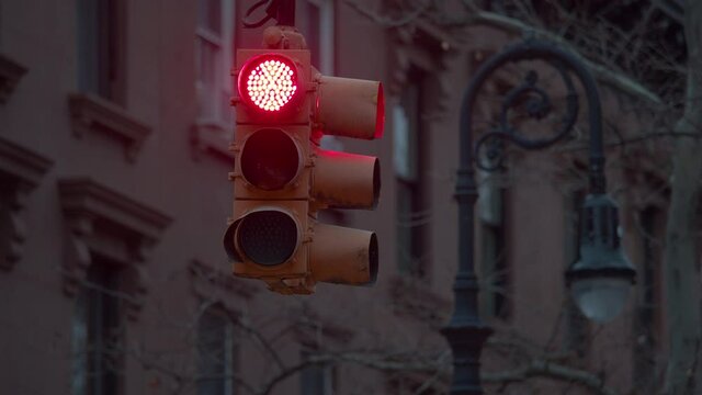 dusk traffic light goes from red to green