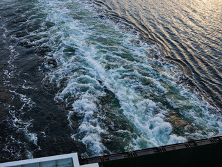Water wake surface waves behind a boat