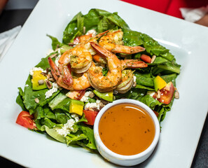 Fried shrimp with vegetable salad.