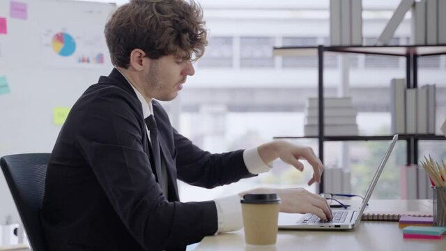 The dismissed company employee was sad. He subsided, wanting to be exhausted by the glass wall.
