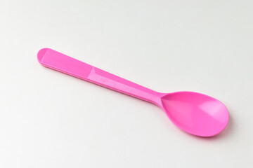 Plastic spoon on white background