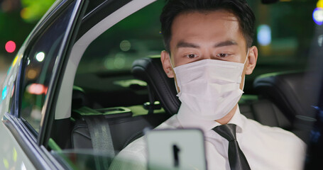 businessman wear mask in car