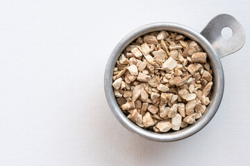Ashwagandha Root in a Measuring Cup