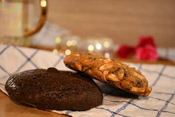 stack of fresh bake cookie on the wood bowl table background