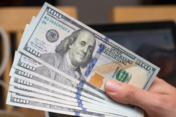 dollars in hand