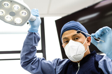 Obraz na płótnie Canvas Image of a dentist with dentistry tools in hands.