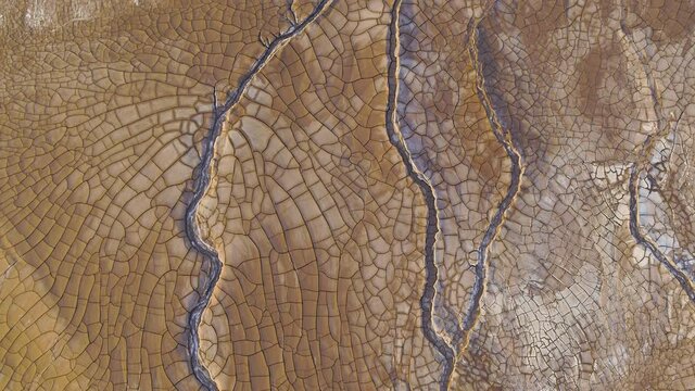 Cracked earth from drought aerial
