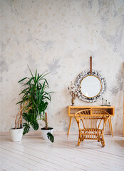 Loft interior. braided chair at the make-up table with a mirror