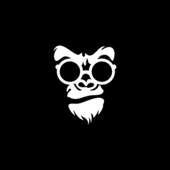 Vector logo illustration, ferocious gorilla head on black background
