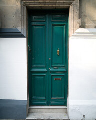 The green gate, in the city streets, old gate