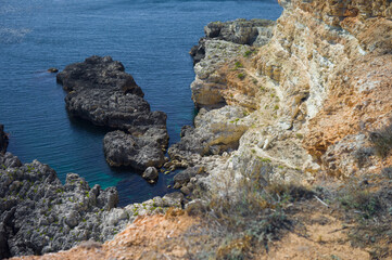 steep descent to the sea