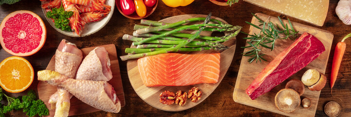Food panorama, shot from above. Healthy organic ingredients, meat and fish, fruit and vegetables,...