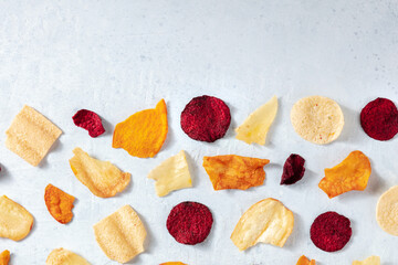 Vegetable chips, overhead flat lay shot. Healthy vegan snack, an organic food pattern with a place for text