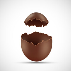 Broken open chocolate egg. Isolated on white background.