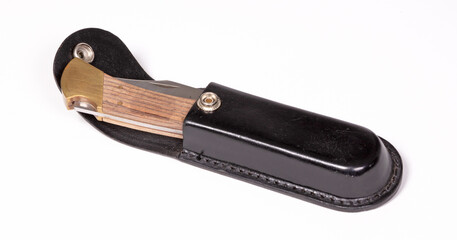 Vintage pocketknife in leather case, isolated