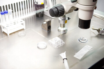 Microscope and optical equipment in the laboratory of the artificial insemination clinic. The...