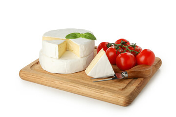 Board with camembert cheese, basil, knife and tomato isolated on white background