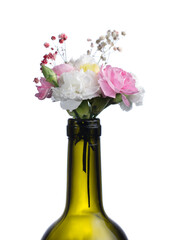 bouquet of flowers white pink yellow from the neck of the bottle. womens day, floral wine aromas.