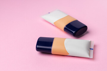 Cosmetics for face complexion on pink background