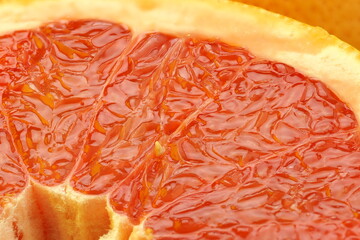 Juicy grapefruit. Texture of sliced grapefruit. Macro-fruiting. High quality