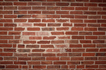 Fototapeta premium Ściana ceglana z cegieł z naprawą