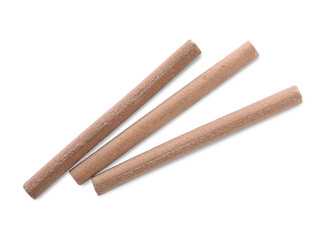 Many aromatic incense sticks on white background