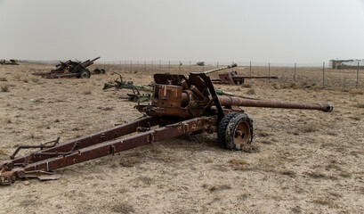 Old armoured vehicles military escorts, guns and tanks in Gardez in Afghanistan
