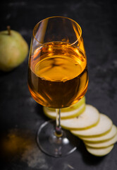 amber or orange wine made from white grapes. in a tall wine glass. Georgian national wine according to old technology