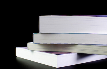 Book stack empty page white side on solid smoke background about student, love and education concept