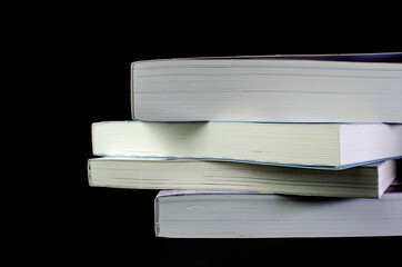 Book stack empty page white side on solid smoke background about student, love and education concept