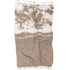 Tie dye Turkish towel shibori pattern on fouta fabric. Watercolor painted beach towel isolated on...