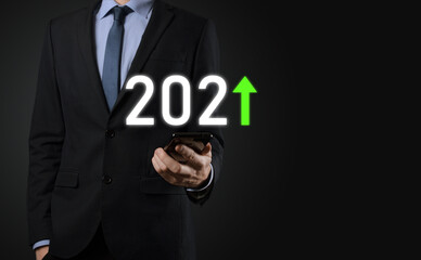 Plan business positive growth in year 2021 concept. Businessman plan and increase of positive indicators in his business, Growing up business concepts.