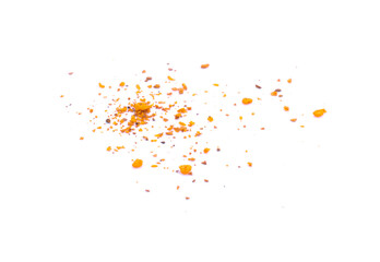 pile crushed red cayenne pepper, dried chili flakes and seeds on white background.