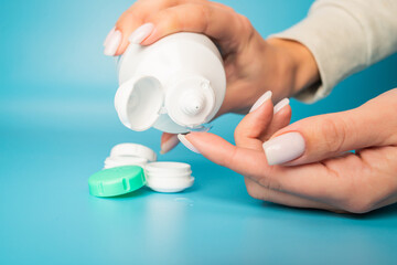 Bottle with lens and case