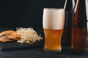 glass of beer with foam
