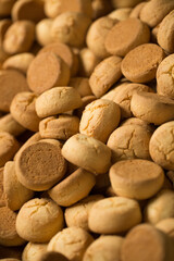 Lots of cookies close up at a factory