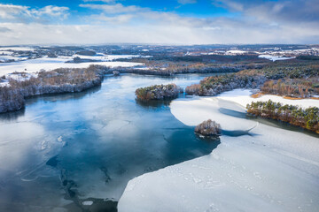 Aerial landscape of the frozen lake in Poland at winter