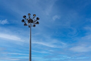 LED Circular light pole on sky background with copy space on the right